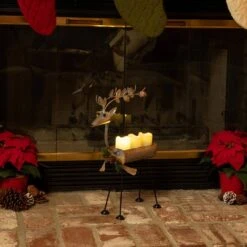 Alpine 19 In. Rustic Metal Deer Candle Decor With Warm White LED Lights -The Home Depot Shop alpine christmas yard decorations ljj1550hh tm 31 1000