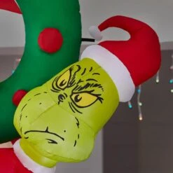 Dr. Seuss 4 Ft Grinch Hanging From Wreath Holiday Inflatable -The Home Depot Shop dr seuss christmas inflatables 22gm14290 a0 1000