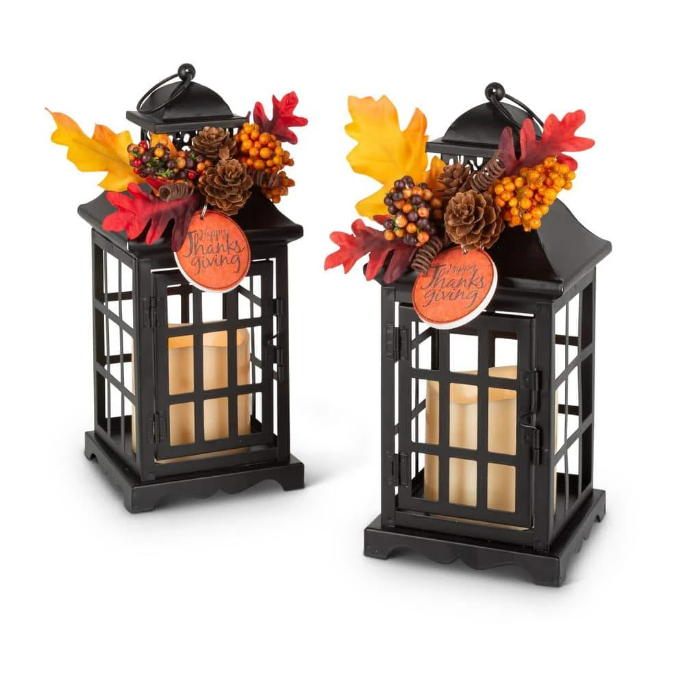 10.5 In. H Black Metal Lanterns With B/O LED Candles And Floral Accents (Set Of 2) 1 10.5 In. H Black Metal Lanterns With B/O LED Candles And Floral Accents (Set Of 2)
