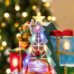 10.75 In. Lighted Toy Market Resin Christmas Village With Movement And Music -The Home Depot Shop glitzhome christmas villages 2040200004 fa 1000