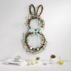 24.5 In. H Easter Bunny Shaped Wreath With Eggs And Satin Ribbon Bow -The Home Depot Shop glitzhome easter decorations 1803203459 31 1000