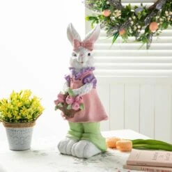 17.5 In. H Easter Resin Bunny Girl Table Decor With Flower Basket 17 17.5 In. H Easter Resin Bunny Girl Table Decor With Flower Basket -The Home Depot Shop glitzhome easter decorations 2006900015 31 1000