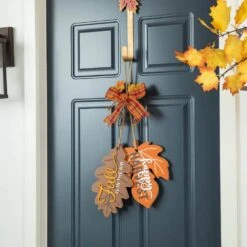 24.5 In. Fall Wooden Christmas Maple Leaves With Bowknot Door Hanger 10 24.5 In. Fall Wooden Christmas Maple Leaves With Bowknot Door Hanger -The Home Depot Shop glitzhome indoor fall decorations 2029800010 4f 1000
