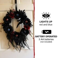 22 In. Prelit Artificial Halloween Wreath With Light-Up Eyeballs -The Home Depot Shop haunted hill farm fall wreaths hhwtheye 1s 31 1000