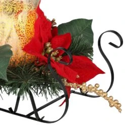 Home Accents Holiday 8.5 In. H Metal Sleigh With Poinsettias And LED Timer Candle In Glass Hurricane -The Home Depot Shop home accents holiday christmas candles 2404670hd 40 1000