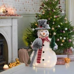 35 In. H White Frosted Snowman Holding Shovel And Christmas Tree Holiday Decoration With Lights -The Home Depot Shop luxenhome christmas yard decorations whhd2130 31 1000