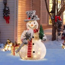 35 In. H White Frosted Snowman Holding Shovel And Christmas Tree Holiday Decoration With Lights -The Home Depot Shop luxenhome christmas yard decorations whhd2130 4f 1000